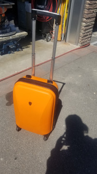Heys Carry on Small Rolling Plastic Suitcase Luggage Orange