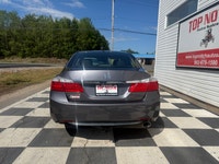 a refined midsize sedan. As an upper-tier trim, it features a leather-trimmed interior, heated front... (image 4)