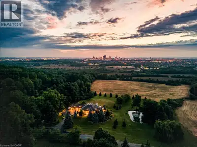 Perched atop the Niagara Escarpment, 7295 Bell School Line offers what may be the finest panoramic v...