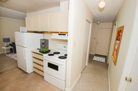 Amenities: Playground • In-suite Laundry • Guest Parking Suite & Building: Two- and three-bedroom bi... (image 4)