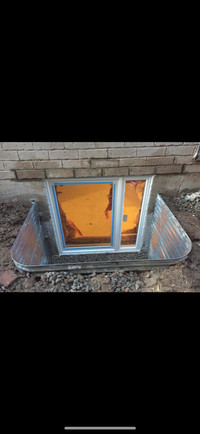 Egress window/ side door cutting and installation.