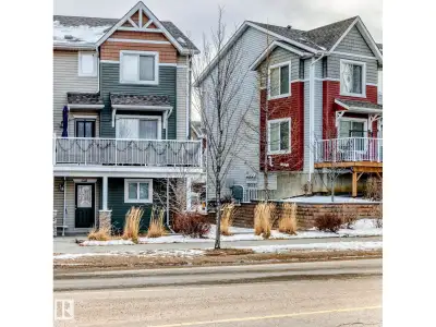 Stunning 3-Bedroom Townhouse in Tamarack! This beautifully maintained home is located in a landscape...