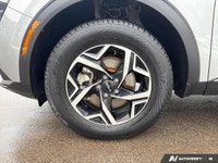 PREVIOUS DAILY RENTAL The *2023 Kia Sportage LX AWD* marks the debut of a radical new generation. Sh... (image 8)