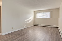 Amenities: Spacious Rooms • Balconies • Heat & Water Included Suite & Building: One-bedroom and two-... (image 6)