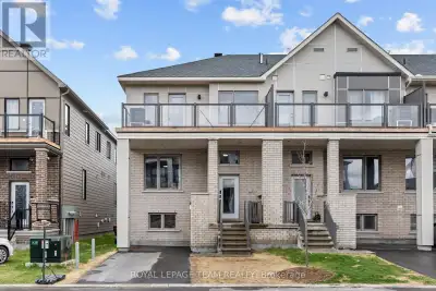 Step into a world of refined living in this stunning end-unit home, perfectly situated for both luxu...