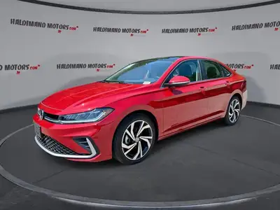 // ACCIDENT FREE!! // // SINGLE OWNER! // Finished in red with a black interior, this 2026 Volkswage...