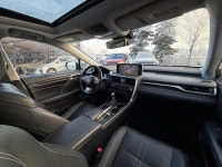 The RX 350 is defined by its "floating roofline" design and the signature Lexus spindle grille. With... (image 8)