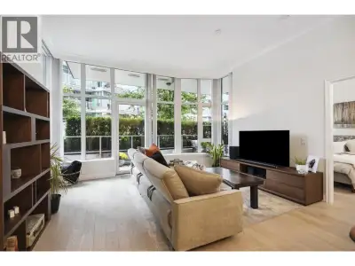 Stunning contemporary 2-bedroom townhome-style suite at Cascade East in the vibrant Shipyards Distri...