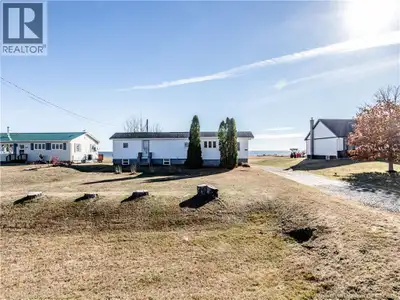 Discover peaceful coastal living with this charming mobile home set on a solid block foundation in t...