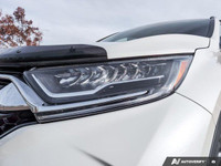 Experience the reliability and power of the 2017 Honda CR-V Touring in stunning white, equipped with... (image 7)