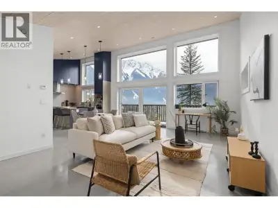 Newly constructed in the coveted Sunstone community, this refined modern home blends architectural s...