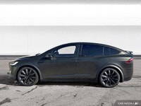 The 2017 Tesla Model X includes a power liftgate, heated front seats, and a navigation system. It of... (image 1)