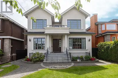 Luxurious custom home in Vancouver´s Marpole area with over 3,770sqft of living Features soaring cei...