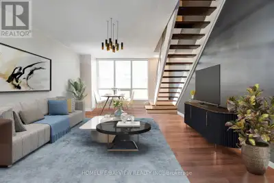 Welcome to The Tides! This rarely available two level loft feels like living in a townhouse! Two pre...