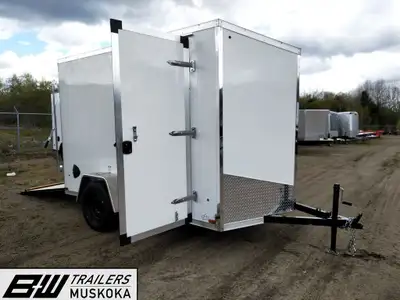US Cargo trailer - 6ft by 10ft with a side door and a ramp door. 2990 lbs GVWR and 1764 lbs payload...