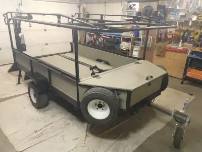 Rebuilt/modified 5x10 trailer w/crane, ladder rack and rear ramp This trailer has been stripped down...