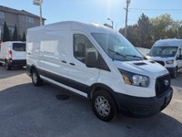 Ready for work. This mid roof transit has power options, divider, bluetooth, a/c, back up camera and... (image 4)