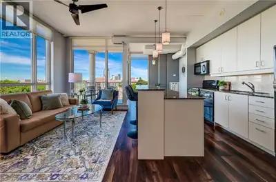 Welcome to this gorgeous Bauer Loft corner unit with 10ft ceilings, windows galore and a phenomenal...
