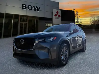 The 2025 Mazda CX-90 MHEV GS-L in a sophisticated gray finish beckons those seeking a premium drivin...