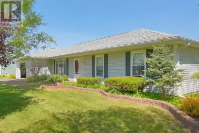 (VIDEO - Click on the Multi-Media Link) Immaculate 3 Bedroom Bungalow with Sunroom & Double Garage W...