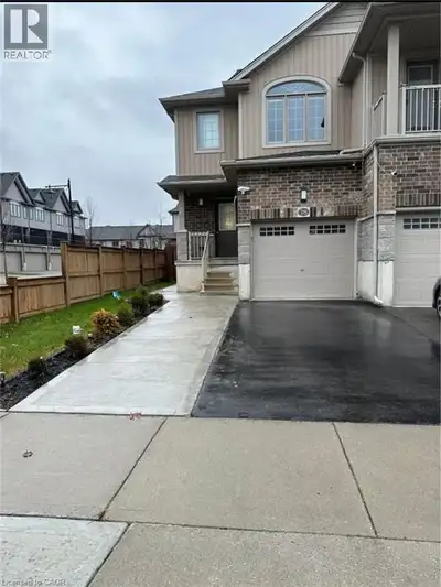 Welcome Home to Corner Townhome in Doon South! Step into this beautifully maintained corner unit tow...