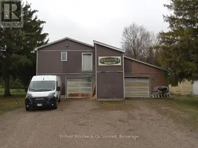 Steel clad building with 2,400 sq. ft. on main level and upper 1,250 sq.ft. office/display area. For...