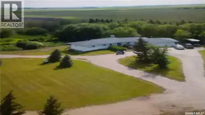153.84 Acres located at Aberdeen Sask. Features a 1910 Sq. Ft. Bungalow with modern appliances and s...