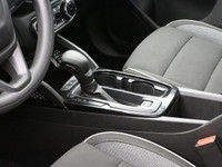 The 2021 Chevrolet Trailblazer, captivating in striking white with a sleek grey-dark interior. This... (image 7)