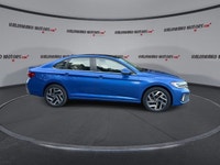 This Volkswagen Jetta has a powerful Turbo Gas 4cyl 1.5L engine powering this Automatic transmission... (image 8)