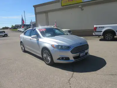 2013 Ford Fusion Titanium. 2.0 L 4 Cylinder ENGINE. AWD……Lether/Heated seats……Phone……GPS…..Back-up c...
