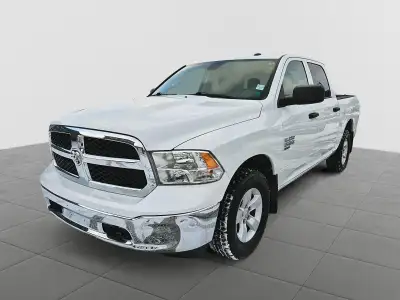 Harness proven capability and essential features in the 2022 Ram 1500 Classic SLT, configured as a 3...