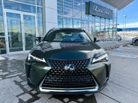 This 2024 Lexus UX 250h Premium presents a strong expression of its crossover qualities, with a bold... (image 4)