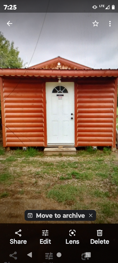 12X20 BUILDING TIN ROOF SHEETED INSULATED TWO SLIDING WINDOWS 36 MAN DOOR HALF LOG SIDING ON FRONT W...