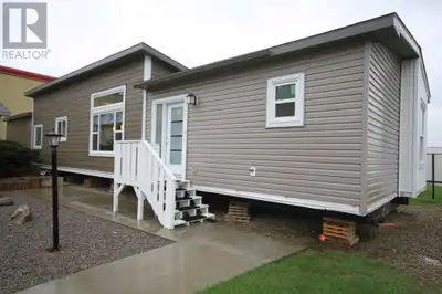 MLS® #A2130190 This brand-new double wide modular home located in The Meadows Subdivision near Taber...
