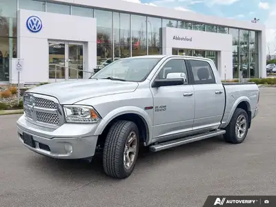 Command your day with this robust 2017 Ram 1500 Laramie Crew Cab Pickup. Powering through tasks or c...