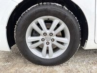 This 2014 Toyota Sienna LE in classic white is a proven, family-friendly minivan known for outstandi... (image 9)