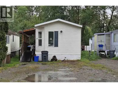 Reverse plan 1995 14' x 66' mobile. Two bedrooms. Open plan design. Very clean & shows well! Fully f...