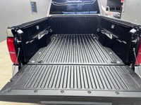 The 2025 Toyota Tacoma SR5, clad in a refined Silver finish, is ready to tackle any terrain with its... (image 6)