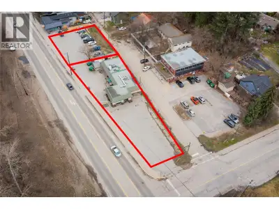 Investor alert! Commercial Property including building and parking lot with approximate half an acre...