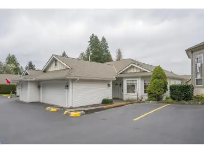 Twin Lakes 1446 sf end unit rancher in the gated 55+ complex. This unit overlooks the pond for natur...