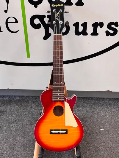 Epiphone Acoustic/Electric  Ukulele Les Paul In Cherry Sunburst, View more