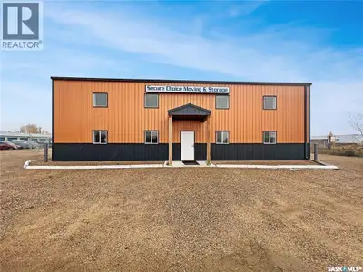 High-Exposure Commercial Property with 2400sqft Shop & FIVE fenced serviced compounds/lots. This 2.5...