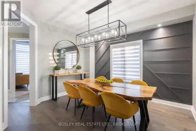 This home is a KNOCKOUT: Featuring a fully equipped In-Law Suite, extended driveway, and a double si...
