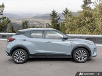 Navigating urban streets and weekend adventures is a breeze with this stylish Gray 2024 Nissan Kicks... (image 5)