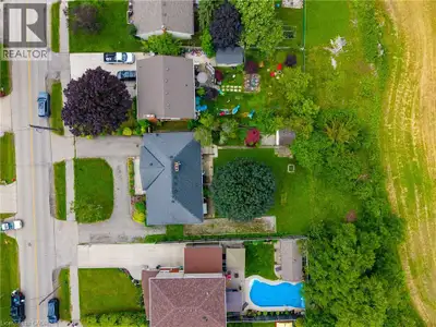 Endless possibilities await on exceptional 75' x 150' lot backing onto tranquil green-space. Nestled...