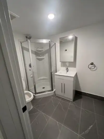 Fully furnished room within a four-bedroom basement apartment, located on Stewart Street in the hear...