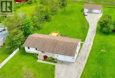 Oversized Bungalow with Heated Workshop, Offering Privacy and All-One-Level Living! Beautifully main...