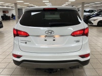 Powerful confidence wrapped in Frost Whitethis 2018 Hyundai Santa Fe 2.4 SE All-Wheel Drive SUV is e... (image 7)