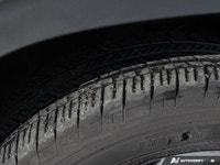 * 4MOTION All-Wheel Drive * Second-row captain's chairs * Panoramic moonroof * Power-adjustable leat... (image 9)