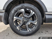 Experience the reliability and power of the 2017 Honda CR-V Touring in stunning white, equipped with... (image 5)